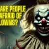 A frightening clown lurking in the shadows representing coulrophobia or fear of clowns.